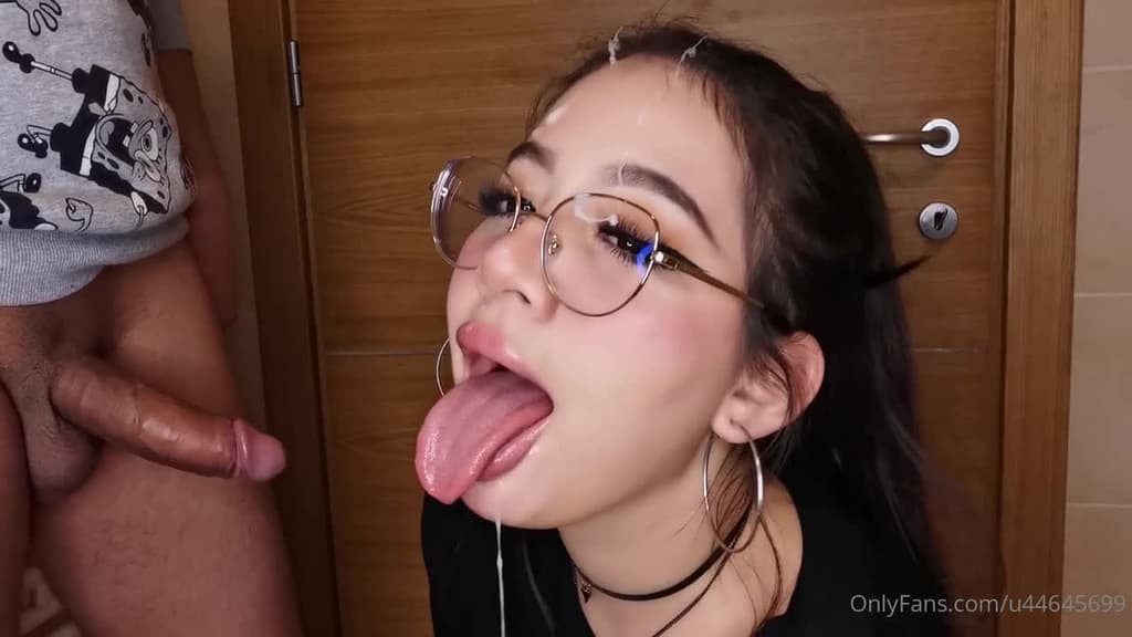 Cute teen in glasses loves receiving sticky facials